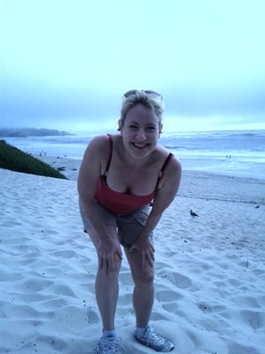 Bear charge on Carmel beach.jpg
