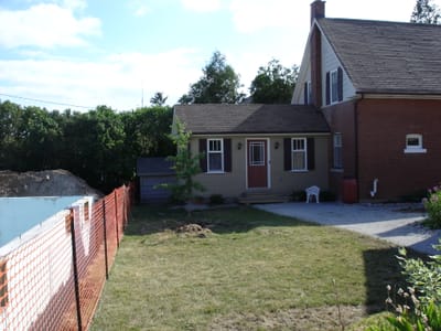 32 new house and Cuttle home 2005.JPG