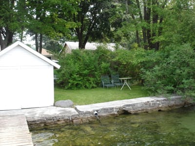 25 Patio and boathouse.JPG