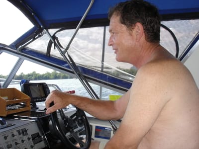 A-083 Brian at helm.JPG