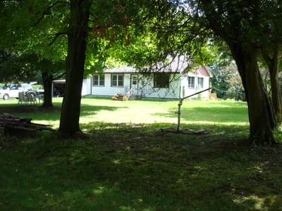 A-0009.1 House thru maples.JPG