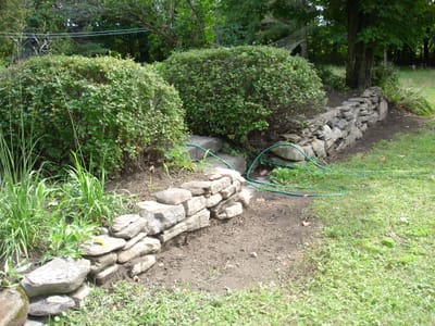 A-0047 The stone wall alongside the garden.JPG