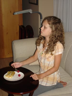 A083 Ricks Bday Emma and cake.JPG