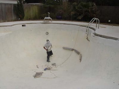 preparing surface of gunite pool copy.jpg